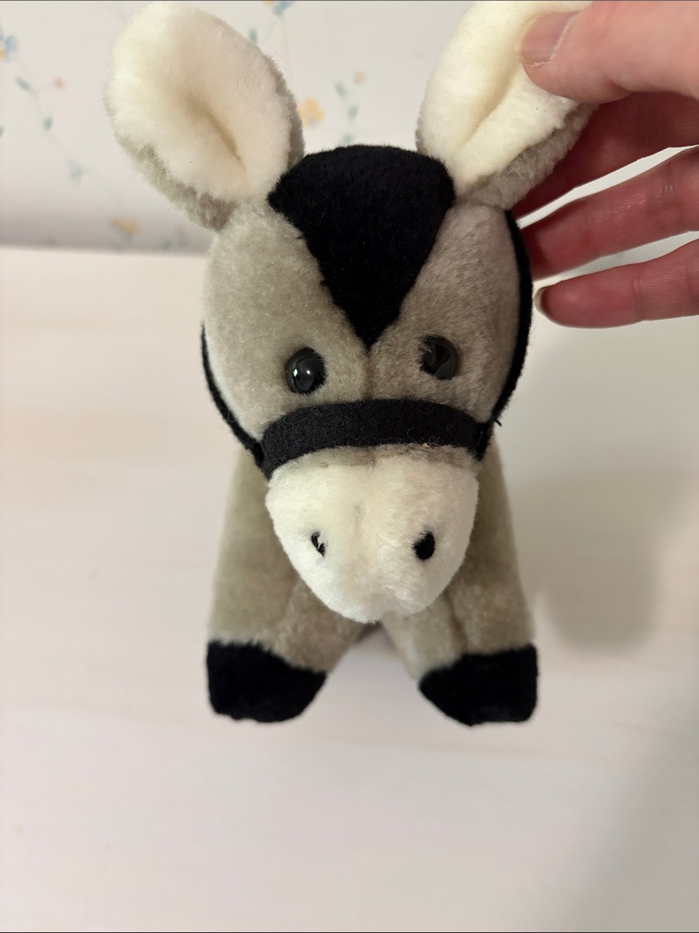 ASI donkey stuffed animal plush with a black halter